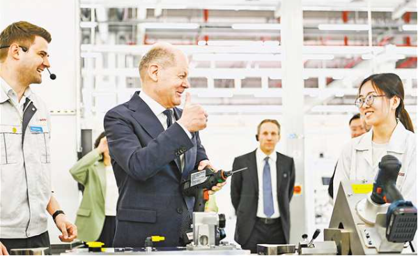 Joie pour Chongqing : saluez chaleureusement la visite du chancelier allemand Olaf Scholz